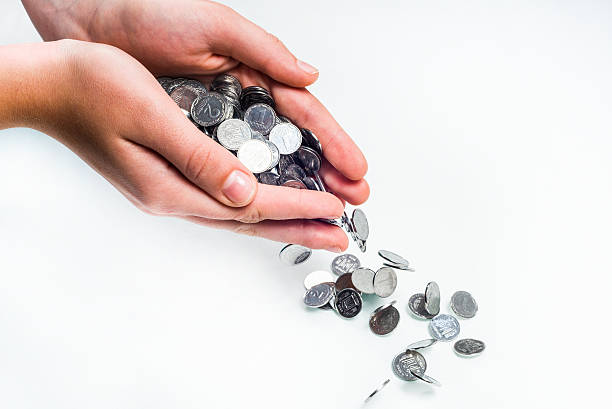 coins in hand stock photo