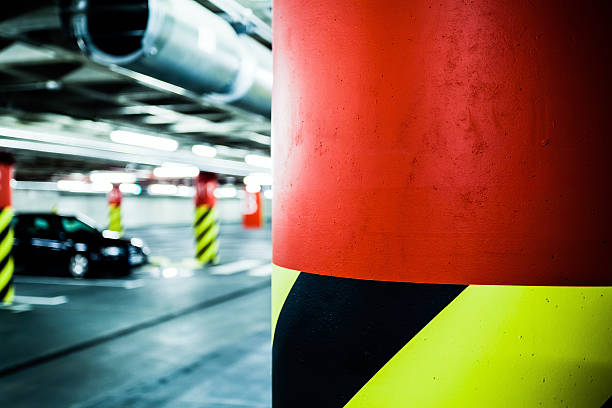 istock Parking garage in basement, underground interior 156152079
