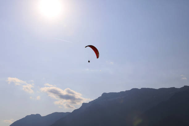 istock Paragliding in Swiss Alps. 1561612122