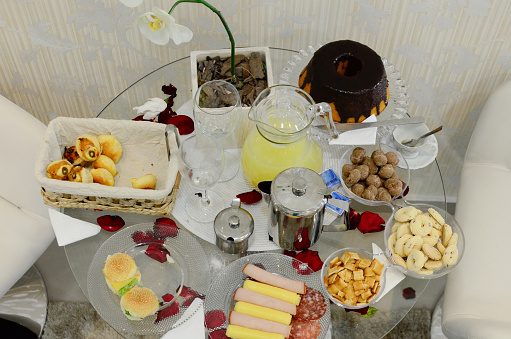 Close-up of breakfast table with a variety of succulent foods to enjoy.