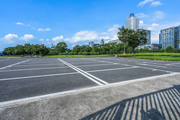 istock Car parking lot with white mark 1561734117