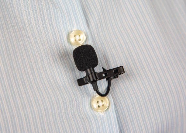 istock lavalier microphone for voice recording on the shirt. audio device technology. wired small microphone 1561742847