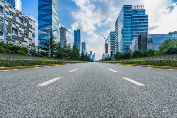 istock city road through modern buildings in nanjing 1561794271