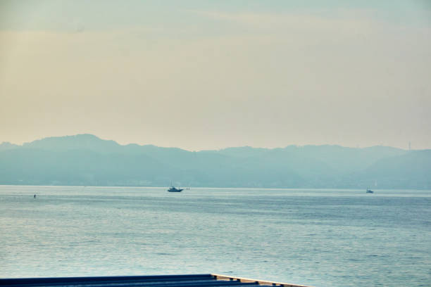 istock Scenic view of ocean during sunrise 1561847902