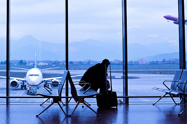 istock Man Waiting for the Flight in Airport Lobby 156188958