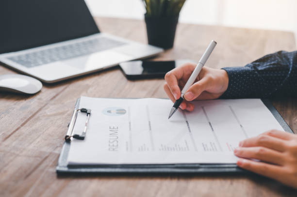 istock Individuals or recent grads looking for work and filling out a job application should first evaluate the application before applying for a position. 1561924817