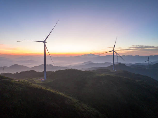istock Wind turbines at sunrise in the morning 1561951505