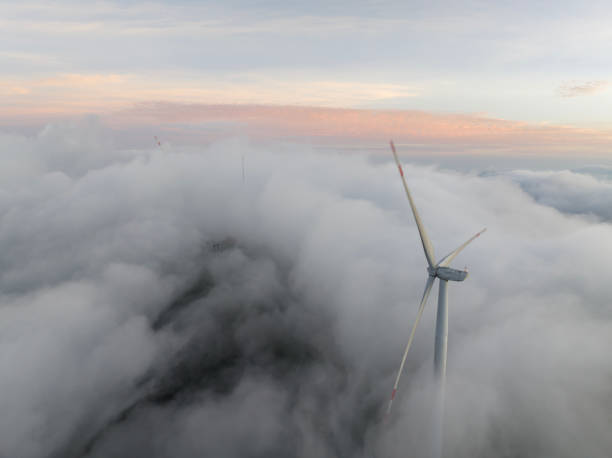 istock Wind turbines in the clouds 1561951511