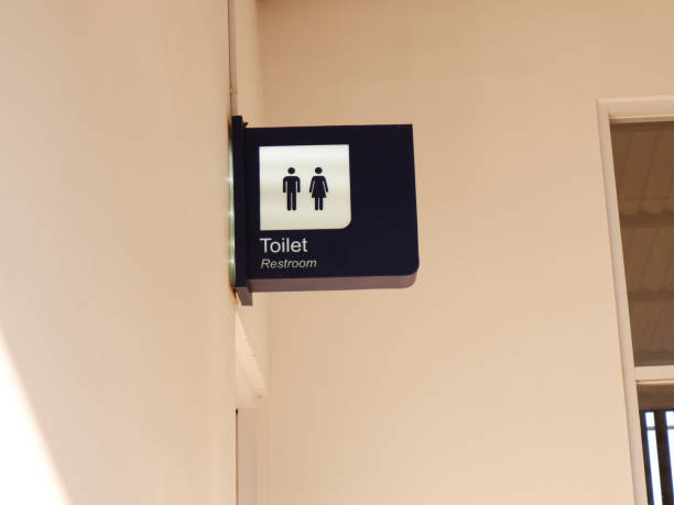 istock modern public toilet sign on the cement wall 1561960529