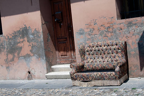 istock abandoned sofa on the street 156199119
