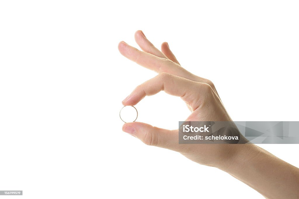 Weibliche hand hält ein ring - Lizenzfrei Accessoires Stock-Foto