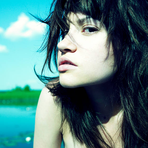 istock Sensual young woman on lake 156199970