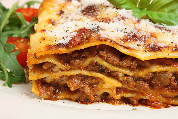 istock Close up meat lasagna with parmesan cheese sprinkled on top 156200878