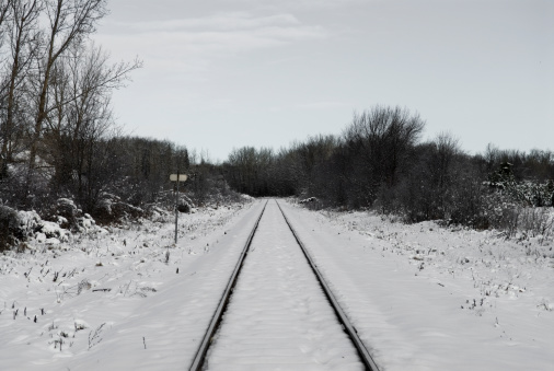 Snow covered train tracks.
