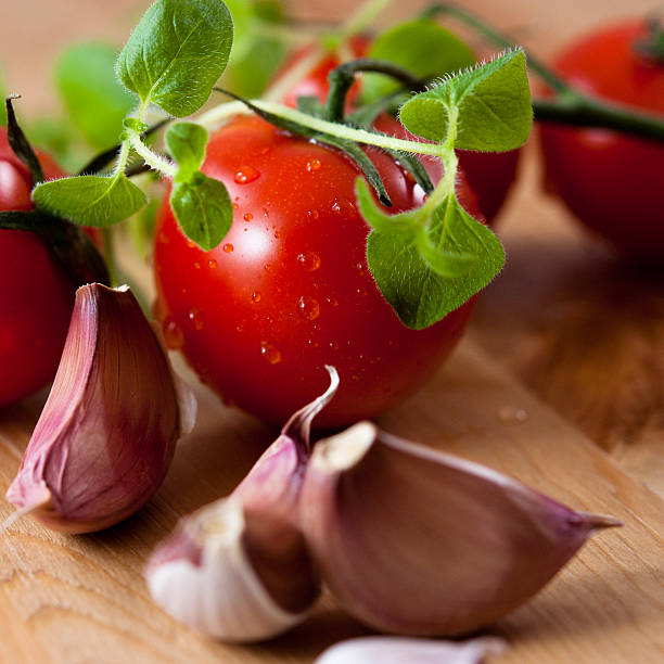 istock Fresh tomatoes,oregano and garlic 156201483