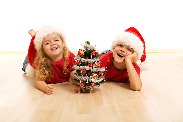istock Happy kids on the floor at christmas time 156202231