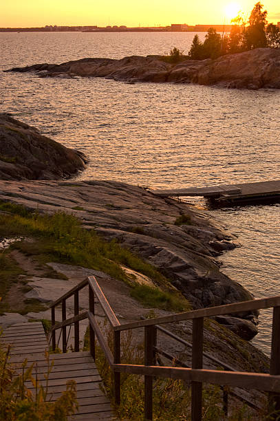 istock Sunset on the sea with descending stairs 156202844