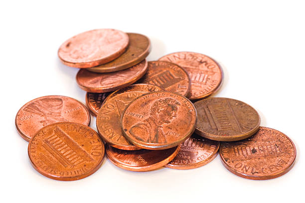 istock Group of Pennies on White 156202859