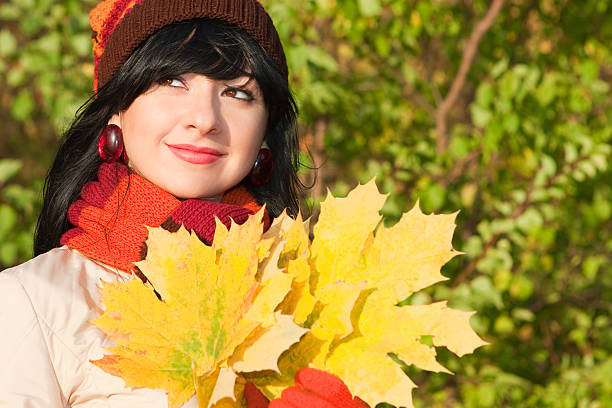 istock Young pretty woman on the autumn leaf 156203062