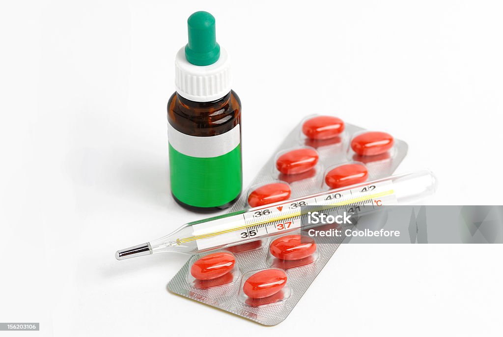 Bottle, blister with pills and thermometer Blister Stock Photo