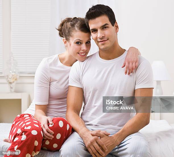 Couple In Pajamas Stock Photo - Download Image Now - 30-39 Years, Adult, Adults Only