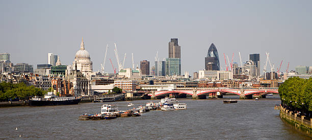 istock London - skyscrapers ships and st. Pauls cathedral 156203392
