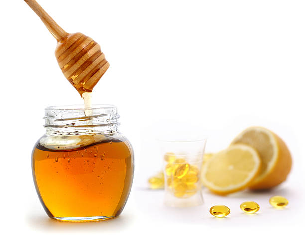 istock hoeny and vitamin C pills 156204062