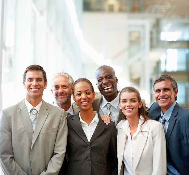 istock Happy business colleagues standing together 156205803