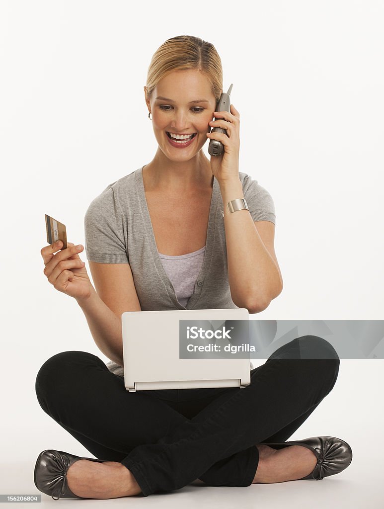 Junge Frau online-shopping - Lizenzfrei Am Telefon Stock-Foto
