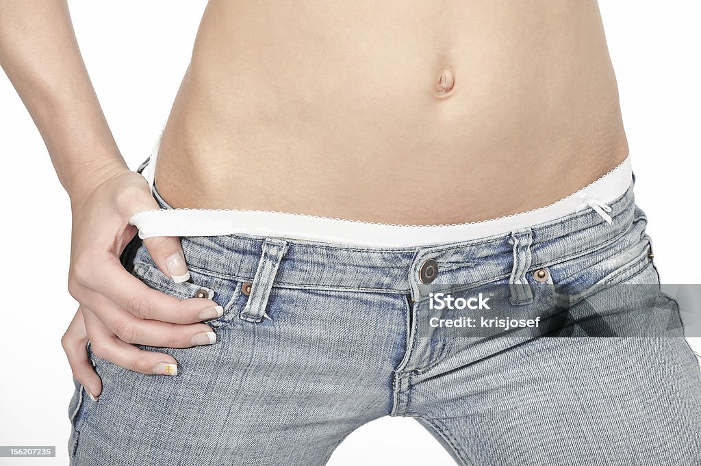 Femme en jeans hanches - Photo de Abdomen libre de droits