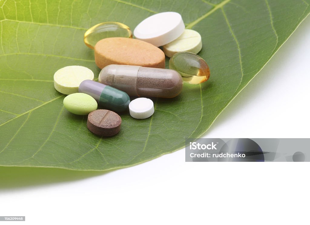 Vitaminen, tablets, Tablette und green leaf - Lizenzfrei Blatt - Pflanzenbestandteile Stock-Foto