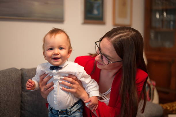 istock Mother holding her little baby boy 1562101849