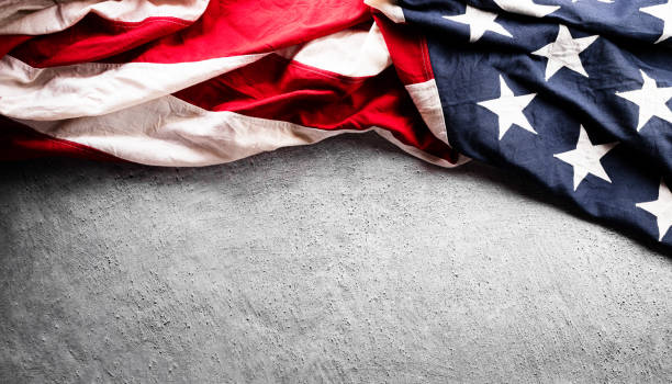 istock Happy Independence day concept made from American flag  on dark stone background. 1562103737