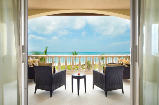 Luxurious veranda with a view of the Caribbean Ocean.