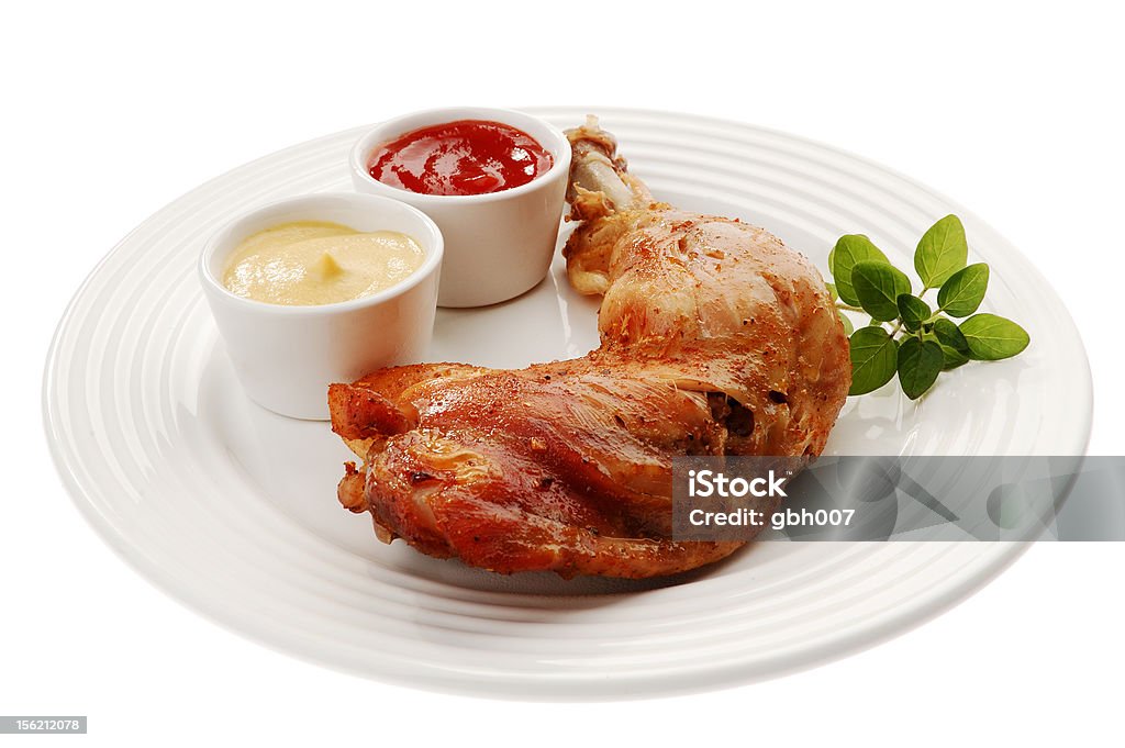 Roasted chicken leg Roasted chicken leg isolated on white background Barbecue - Meal Stock Photo