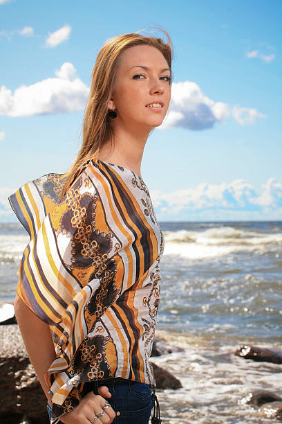 Woman on beach stock photo