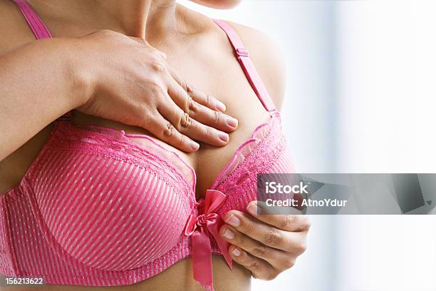 Woman Doing Self Breast Examination Stock Photo - Download Image Now - Breast Examination, Women, Bra