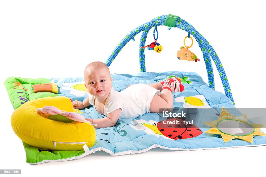 Criança pequena no playmat - Royalty-free Ginásio do Bebé Foto de stock