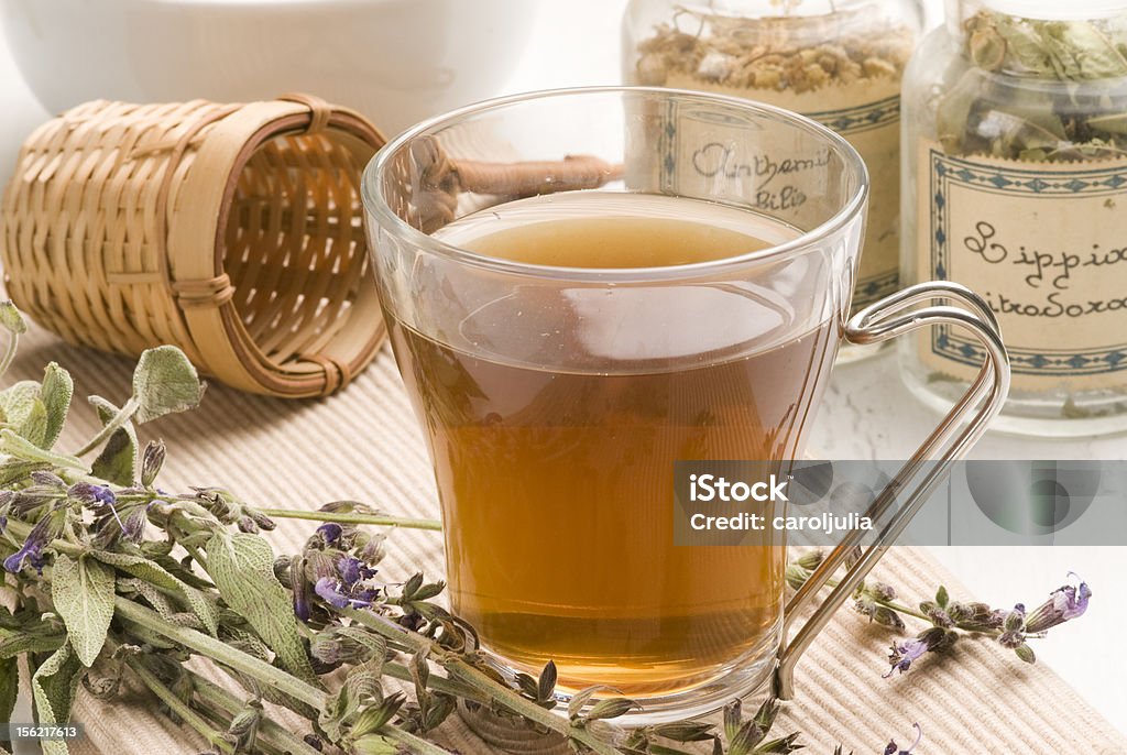 Herbal tea. Lavender infusion. Herbal tea.Lavender infusion in a glass cup.Lavandula officinalis.Naturopathy.Selective focus. Alternative Therapy Stock Photo