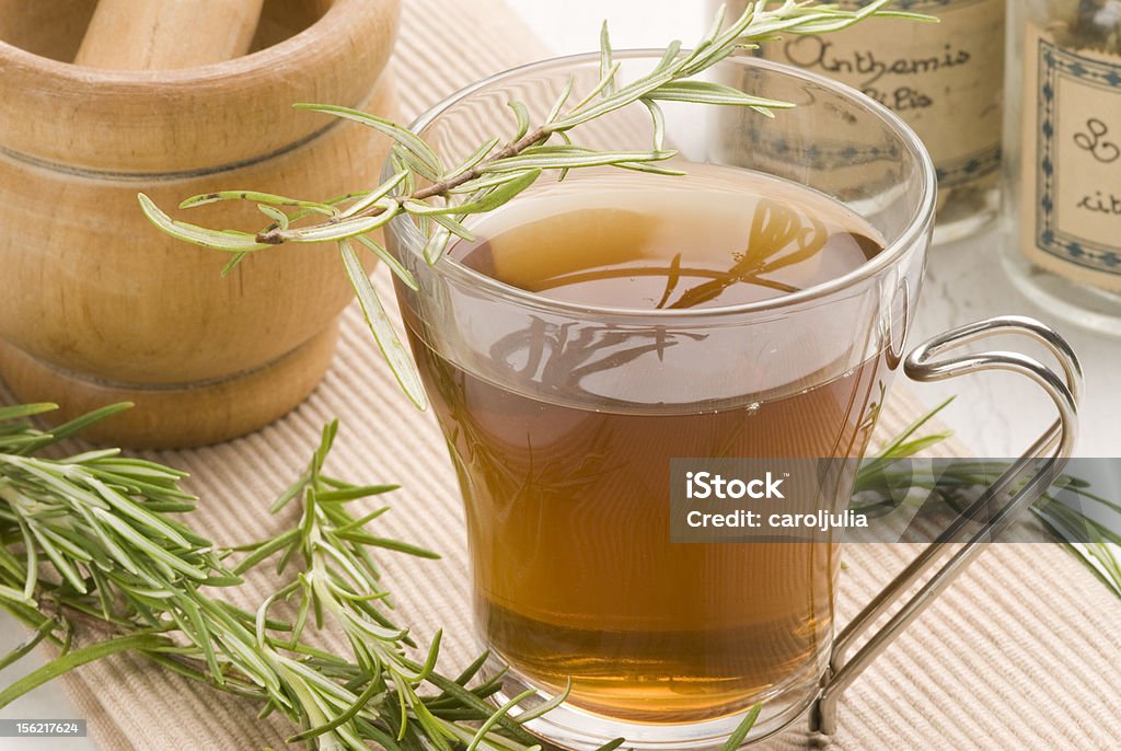 Herbal tea. Rosemary infusion. Herbal tea.Rosemary infusion in a glass cup.Rosmarinus officinalis.Naturopathy.Selective focus. Alternative Therapy Stock Photo