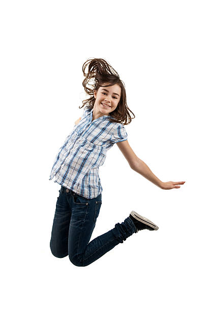 istock Girl jumping isolated on white background 156218299
