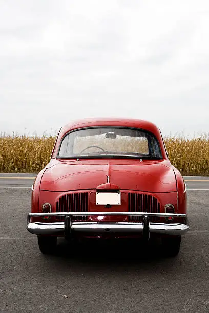 Photo of Old Red Car Rear View