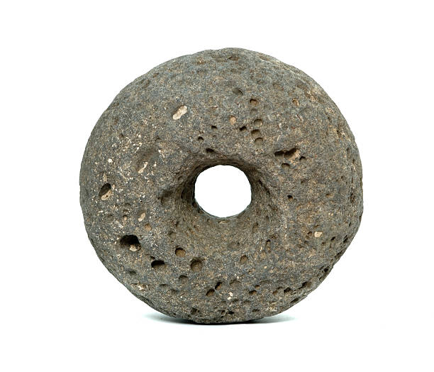 istock A torus made from porous stone on a white background 156218961