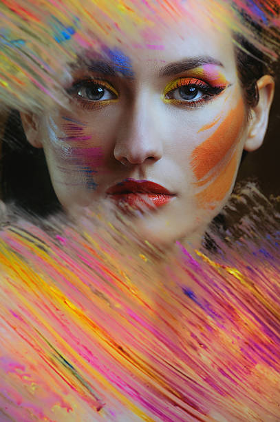istock beautiful woman in color paint 156220752
