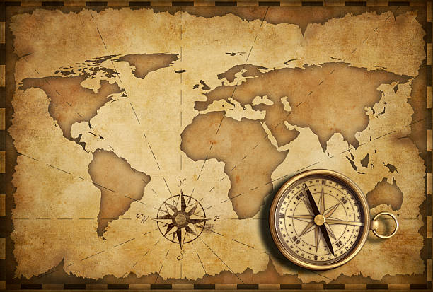 istock aged brass antique nautical pocket compass with old map 156223677