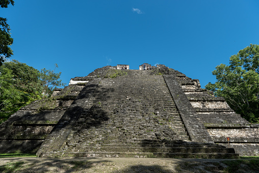 Pyramid and the Temple in Tikal Park. Sightseeing object in Guatemala with Mayan Temples and Ceremonial Ruins. Tikal is an ancient Mayan Citadel in the Rainforests of Northern Guatemala.
