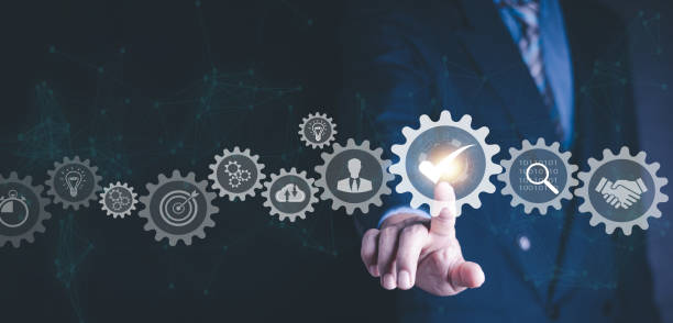 istock Quality management with QA  assurance, QC control and improvement. Standardization and certification concept. Compliance to regulations and standards. Concept with manager or auditor. 1562267526