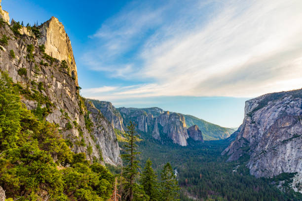 Yosemite Valley on a sunny summer afternoon viewed from Four Mile Trail, Yosemite Valley National Park, California, USA. Viewed from Four Mile Trail.