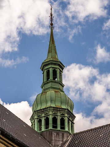 Copenhagen, Denmark - July 20, 2023: Holmens kirke (church) spire. Holmens kirke, the naval church in central Copenhagen, built in 1562 was originally an anchor forge, but converted to church in 1619