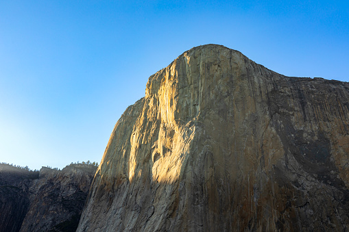Close up details of large rock formations and granite walls in Yosemite National Park, California, USA.